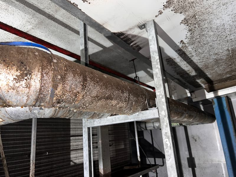 Rusty air conditioner pipes — Commercial Air Conditioner Cleaning in Brisbane, QLD