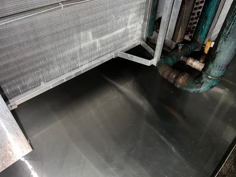Shiny metal surface around industrial air conditioner after cleaning — Commercial Air Conditioner Cleaning in South East QLD